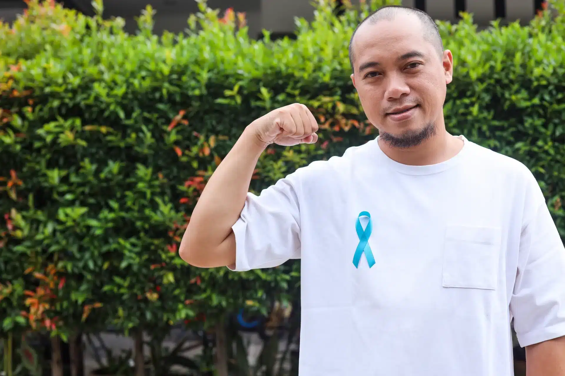 Smiling Asian Young Man With Blue Ribbon Show Powe 2025 03 14 23 24 39 Utc